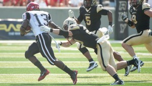 Thomas Holloway makes another tackle for Army in season opener